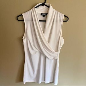 DKNY.  New with out tags.  flattering white blouse